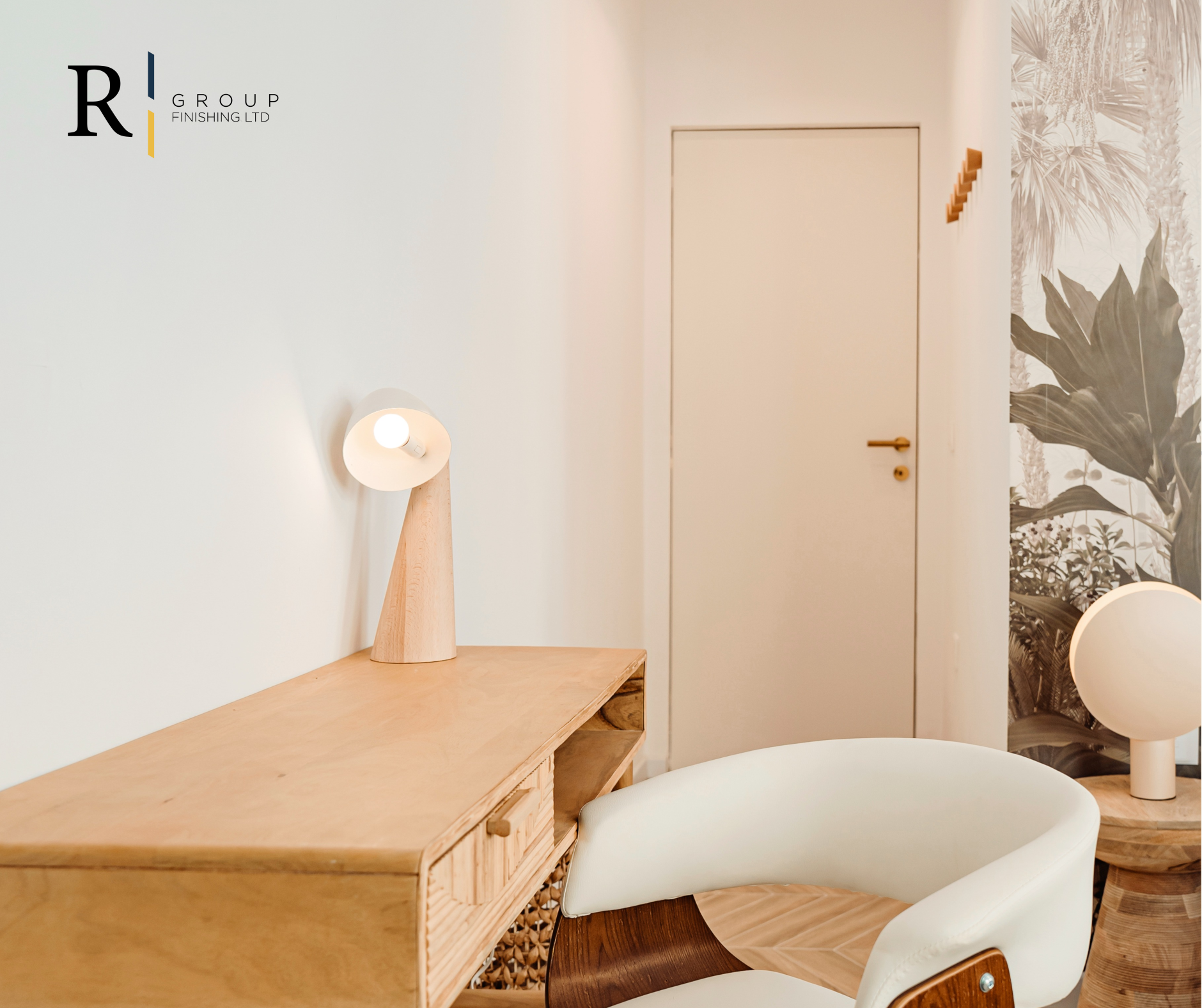 Minimalist interior with white door and bespoke wallpaper by R Group Finishing